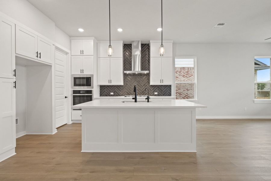 Furnished interior view inside a new home in Heritage, Dripping Springs (Image 11).