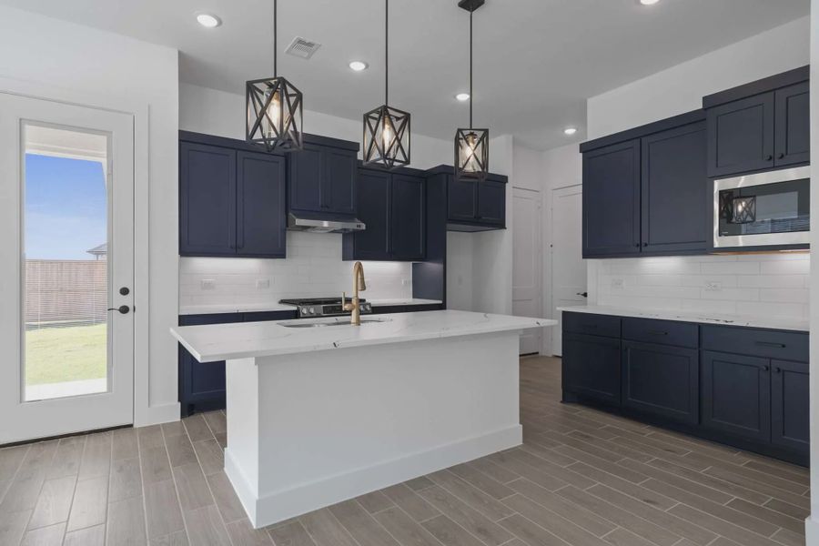 Image 22 representing the Oakmont by Chesmar Homes in Riceland Alley Loads, Mont Belvieu, TX.