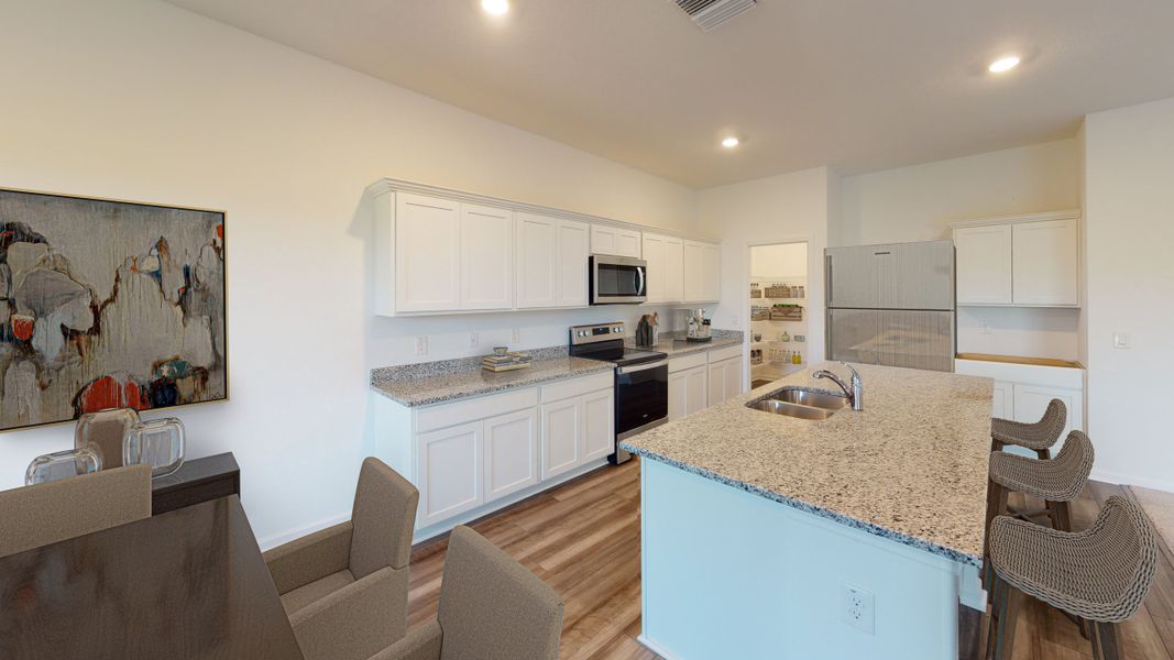 Representative furnished interior of a home built from the Europa by Starlight Homes in Andalusia, Loris (Image 5).