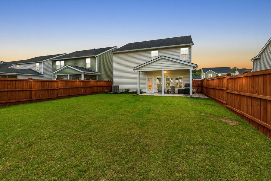 Exterior details and patio area of a home in Heron's Walk at Summers Corner, Summerville (Image 4).