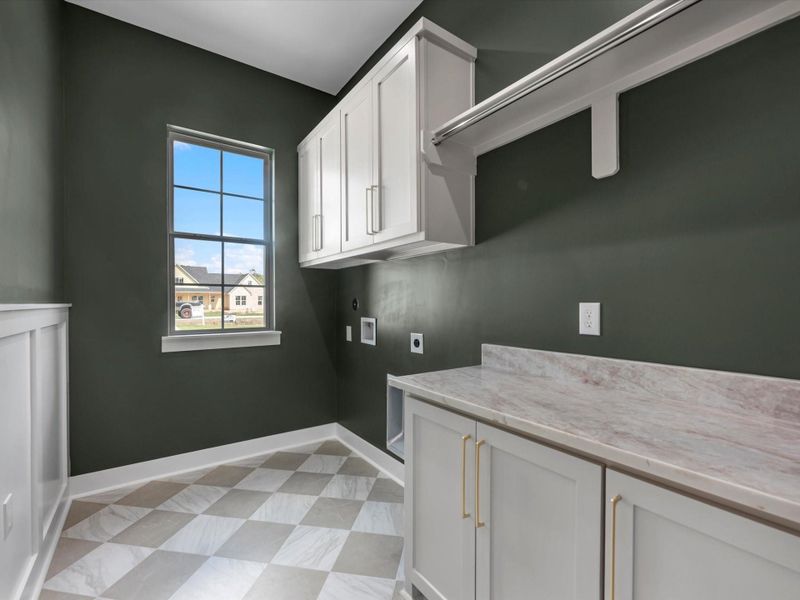 Laundry room with custom cabinetry