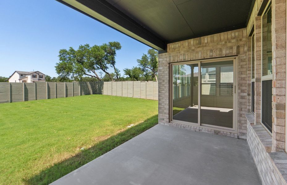 Exterior details and patio area of a home in Wolf Ranch, Georgetown (Image 26).