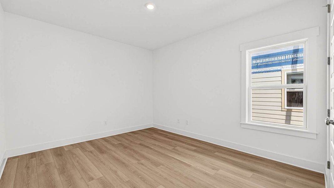 Representative unfurnished interior of a home built from the The Lily by D.R. Horton in WindMark Beach, Port Saint Joe (Image 33).