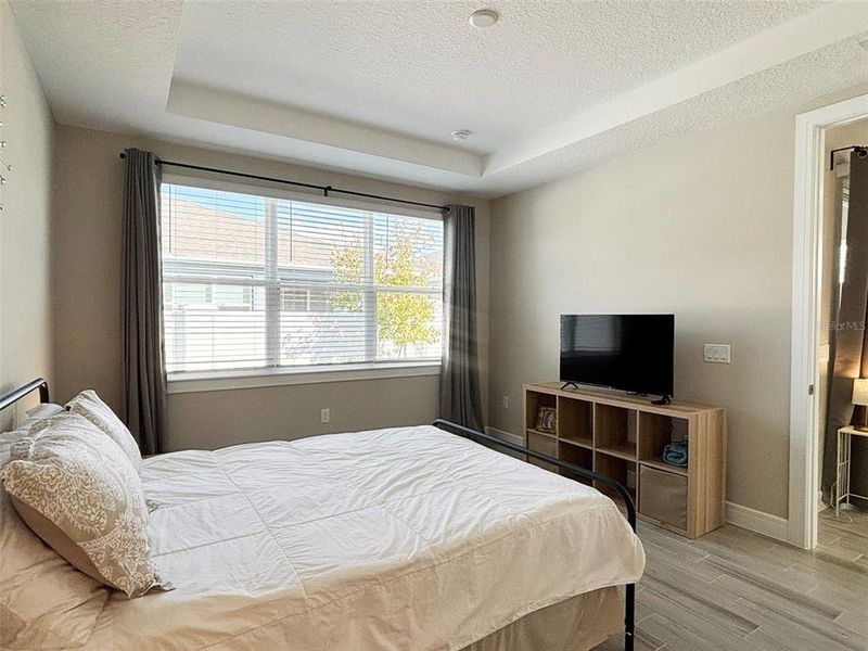 Furnished interior view inside a new home in Del Webb Oasis, Winter Garden (Image 27).
