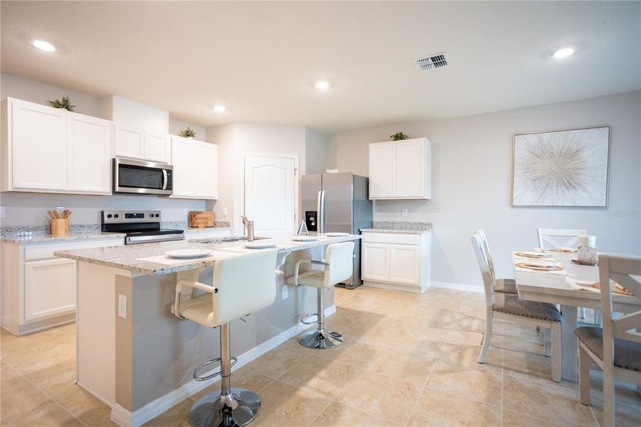 Furnished interior view inside a new home in Harmony West, St. Cloud (Image 6).