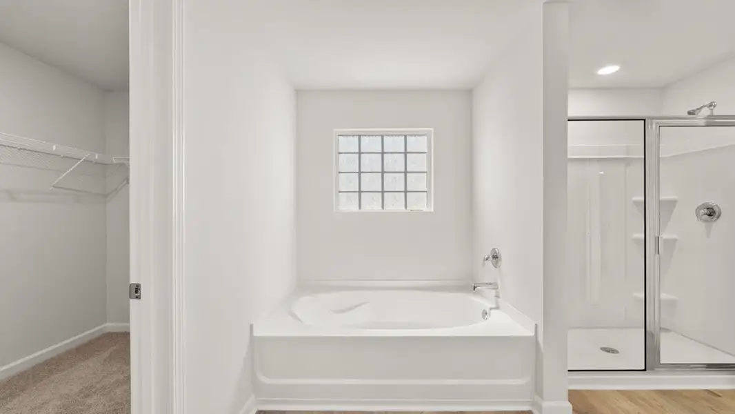 Representative furnished interior of a home built from the Aisle by D.R. Horton in Rolling Meadows, Jasper (Image 12).