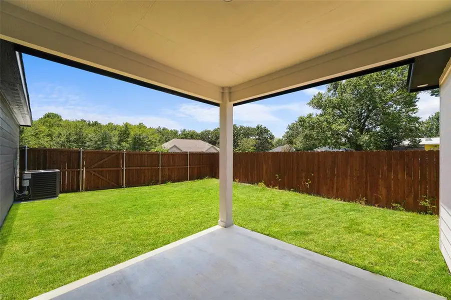Covered patio with concrete flooring Covered patio with concrete flooring
