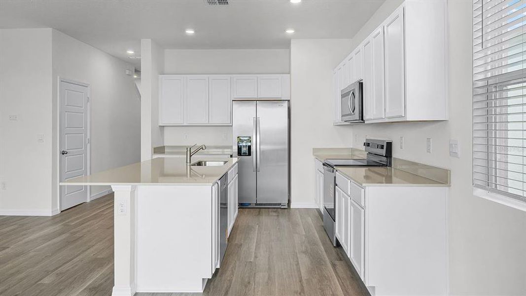 Furnished interior view inside a new home in Harmony at Lake Eloise, Winter Haven (Image 10).