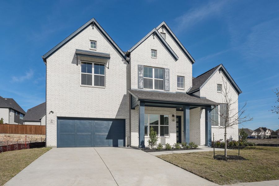 Front exterior of a new home in Quail Hollow, Rockwall, TX, highlighting curb appeal (Image 26).