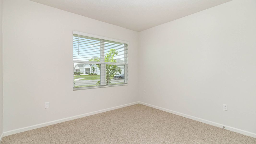Spacious, unfurnished interior of a new home in Cypress Bay West, Palm Bay (Image 21).