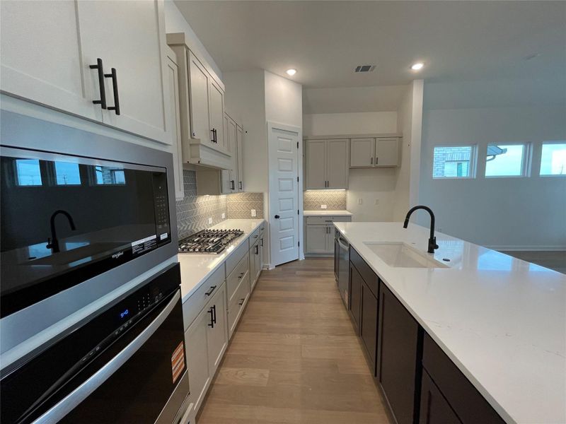 Stunning Finishes in Open Concept Kitchen