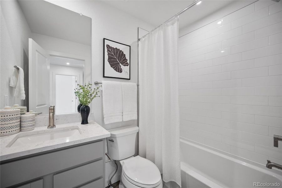 Furnished interior view inside a new home in The Commons at Victory Ridge, Colorado Springs (Image 15).