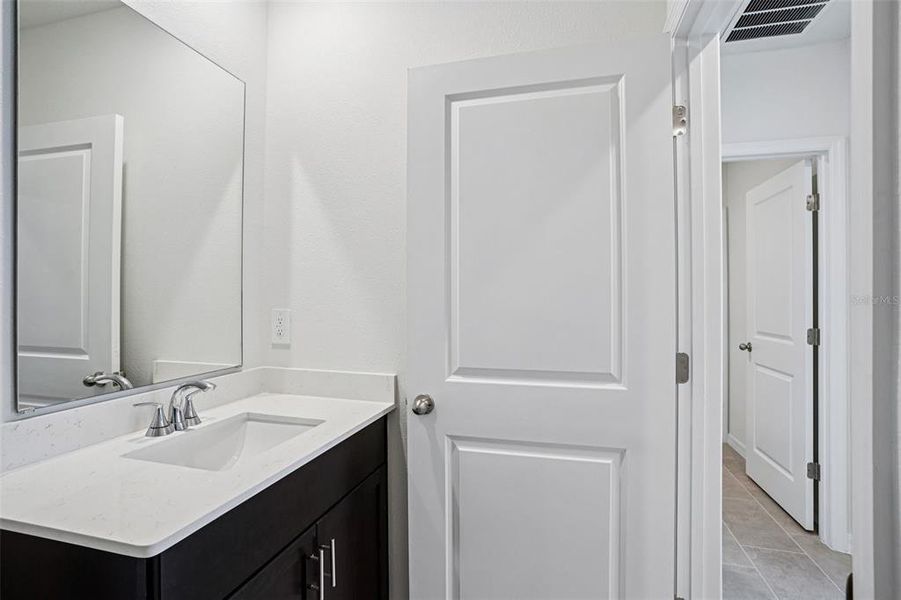 Furnished interior view inside a new home in Ridgehaven - Villas, Ormond Beach (Image 10).