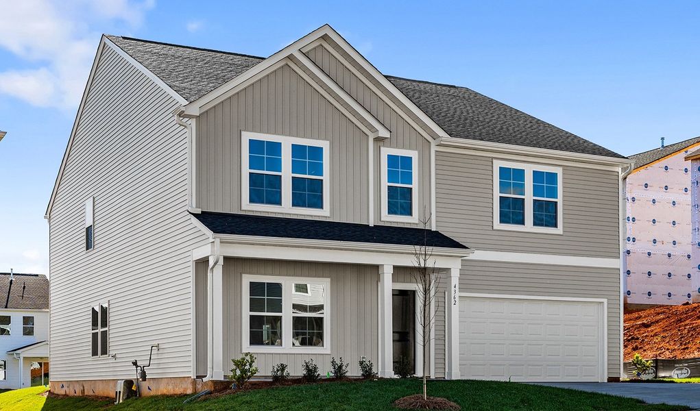 Front exterior of a new home in Hanes Lake, Winston-Salem, NC, highlighting curb appeal (Image 2).