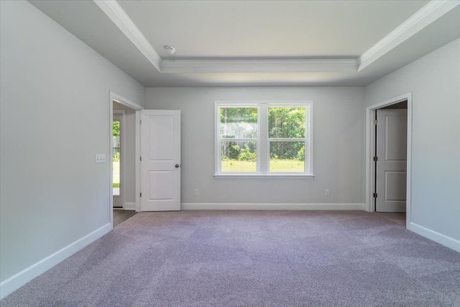 Retreat to the owner's suite with tray ceiling. Retreat to the owner's suite with tray ceiling.