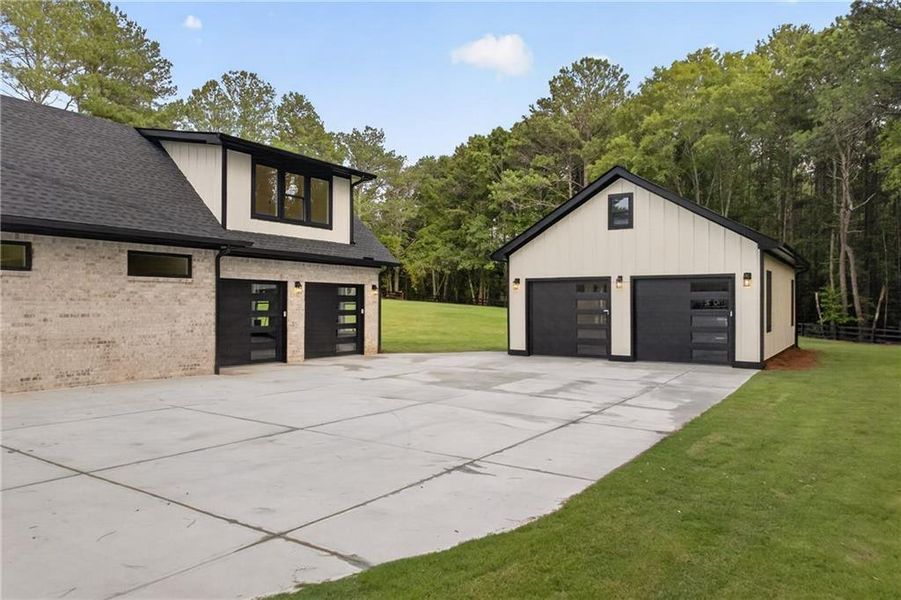 Front exterior of a new home in , Monroe, GA, highlighting curb appeal (Image 28).