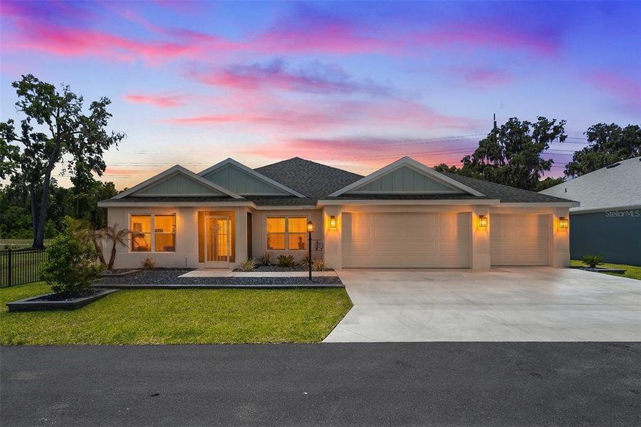 Front exterior of a new home in , The Villages, FL, highlighting curb appeal (Image 25).