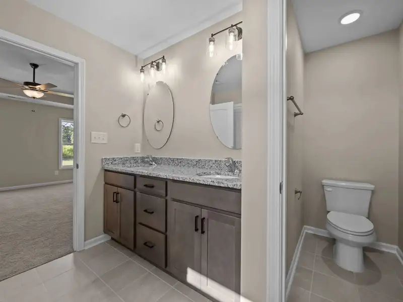 Representative furnished interior of a home built from the Mason A by JC Jackson Homes,LLC in Heritage Pointe, Newport (Image 4).