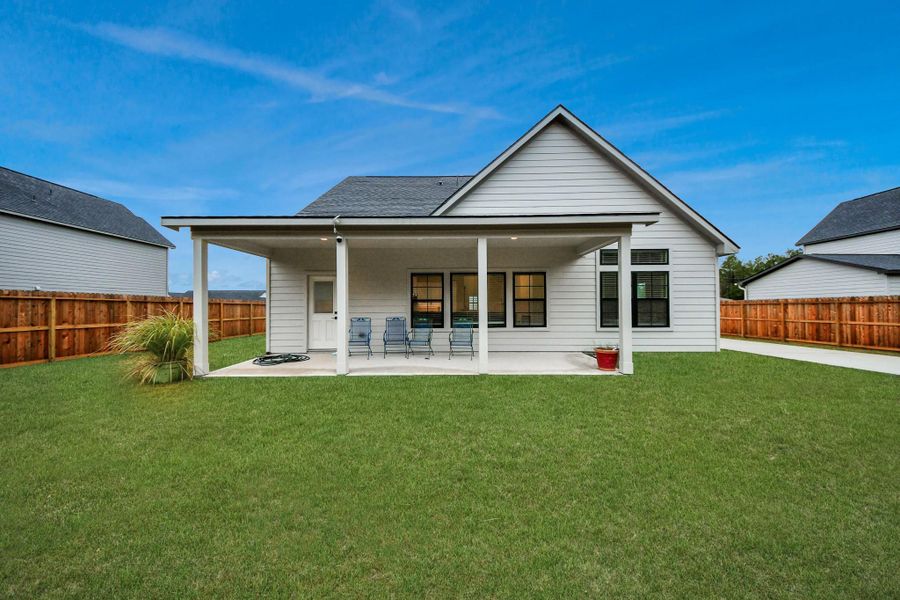 Exterior details and patio area of a home in Spring Branch Crossing, Conroe (Image 22). Exterior details and patio area of a home in Spring Branch Crossing, Conroe (Image 22).