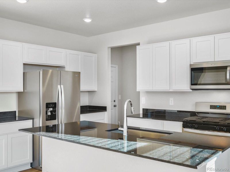 Furnished interior view inside a new home in Revere at Johnstown, Johnstown (Image 8).