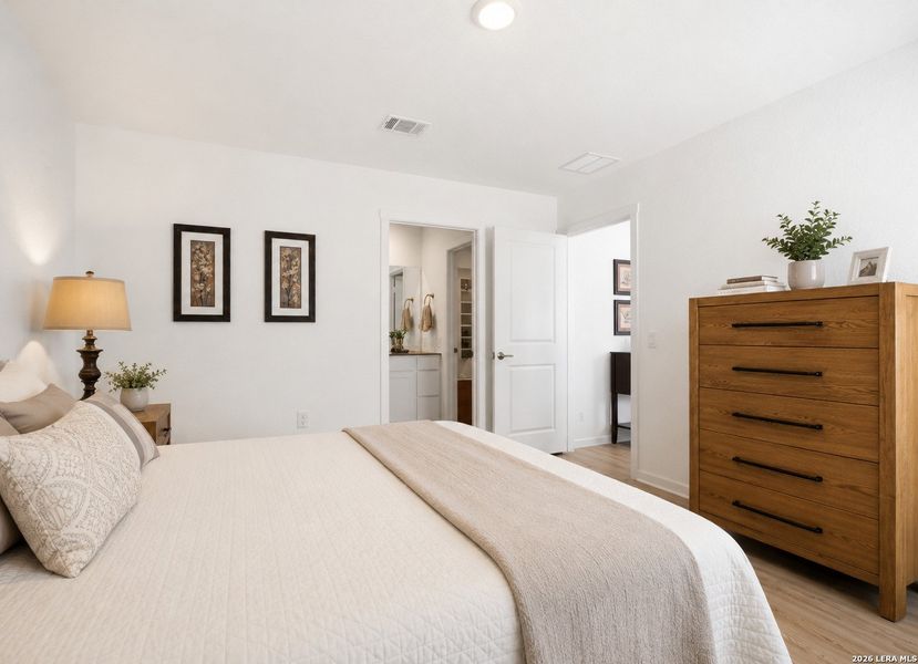 Furnished interior view inside a new home in Tarasco Gardens, San Antonio (Image 9).
