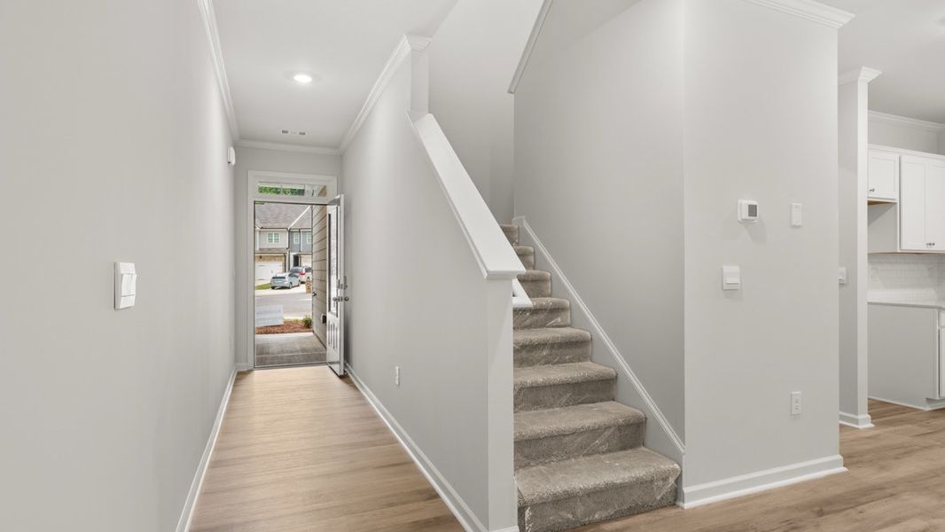 Representative unfurnished interior of a home built from the Salisbury by D.R. Horton in Waypoint, Flowery Branch (Image 12).