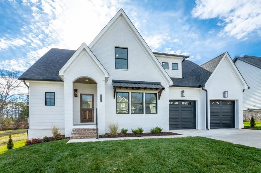 Representative exterior photo of a completed home built from the Carolina A by Riverstone Construction, LLC in Faith View, Ooltewah, TN (Image 17). Representative exterior photo of a completed home built from the Carolina A by Riverstone Construction, LLC in Faith View, Ooltewah, TN (Image 17).