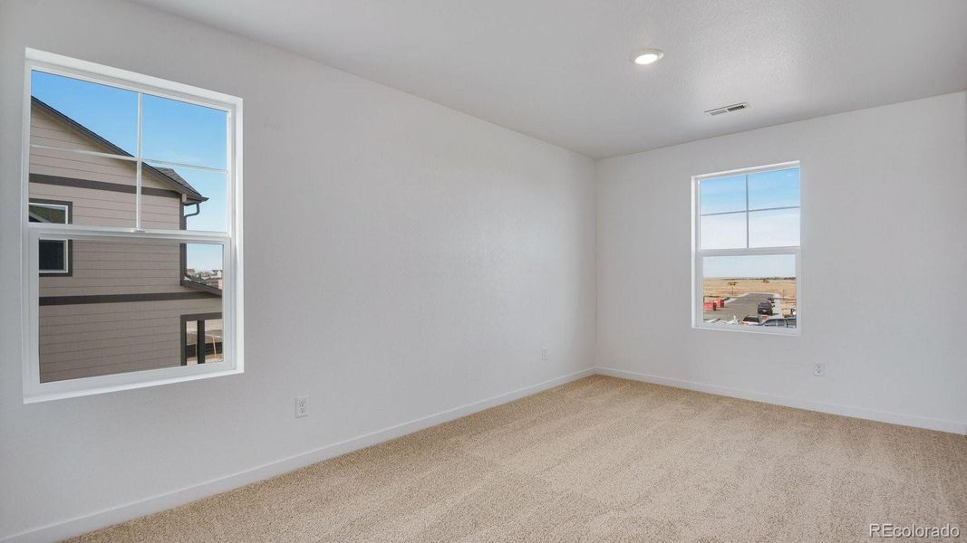 Spacious, unfurnished interior of a new home in Settlers Crossing, Commerce City (Image 32).