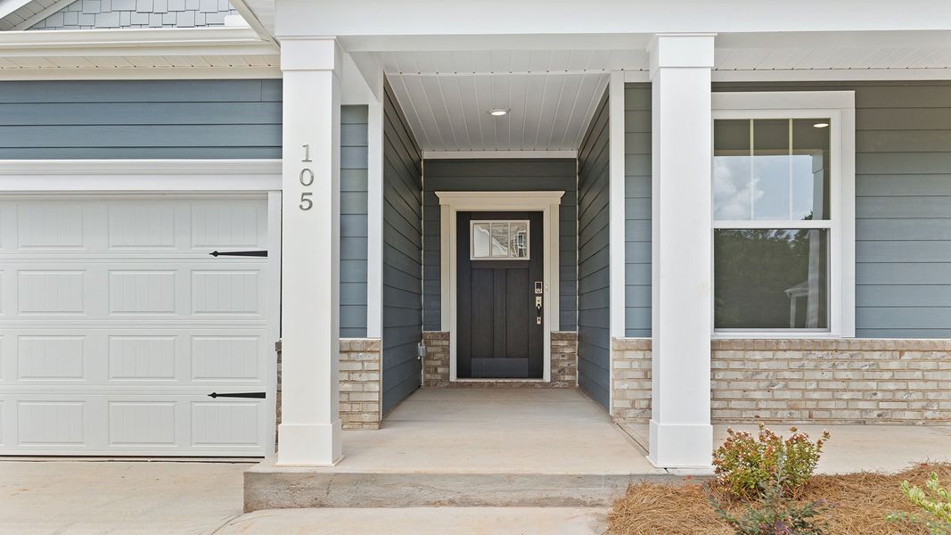 Exterior details and patio area of a home in Adams Glen, Greenville (Image 2). Exterior details and patio area of a home in Adams Glen, Greenville (Image 2).