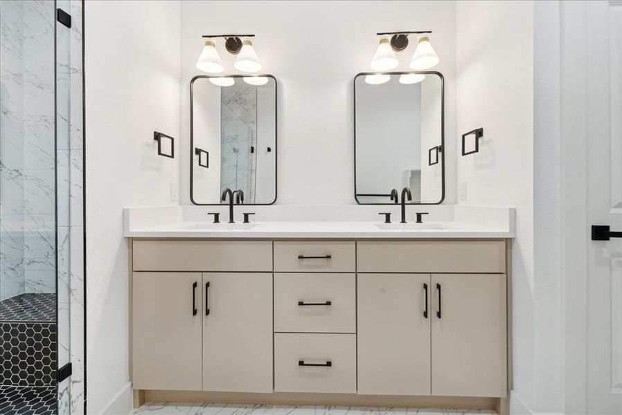 Bathroom with vanity and an enclosed shower