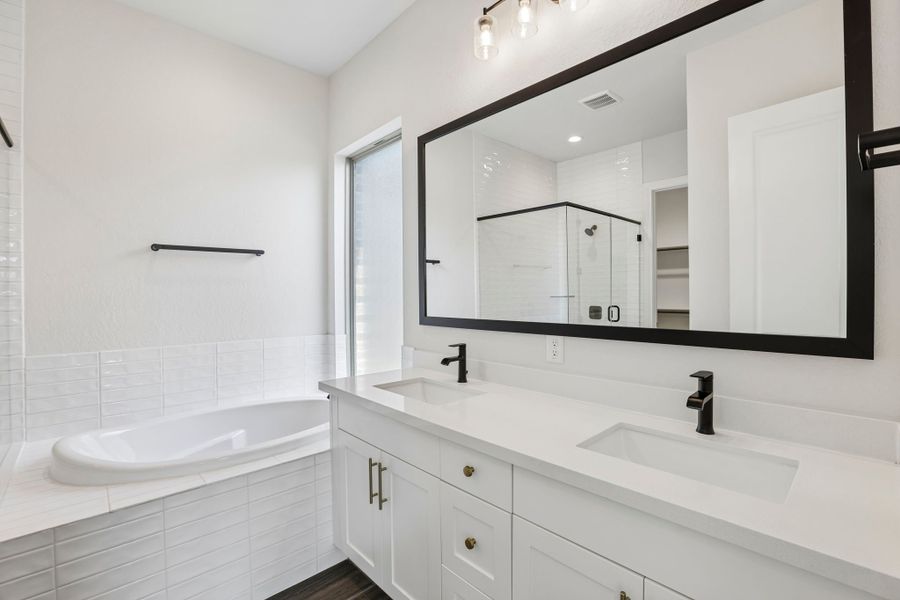 Furnished interior view inside a new home in 6 Creeks, Kyle (Image 7).