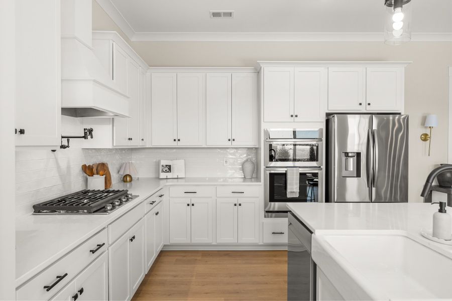 Representative furnished interior of a home built from the Emmy by Hunter Quinn Homes in Walker's Pointe, Anderson (Image 18).