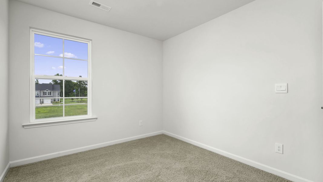 Representative unfurnished interior of a home built from the Newton by D.R. Horton in The Gables at Edinborough Townes, Gibsonville (Image 13).