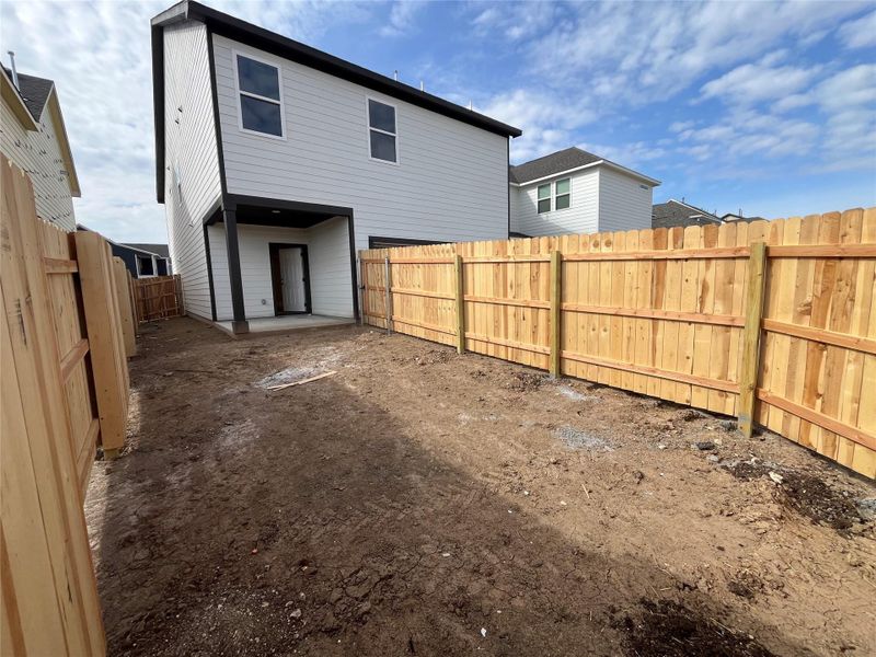 Exterior details and patio area of a home in The Cottages at Lariat, Liberty Hill (Image 3).