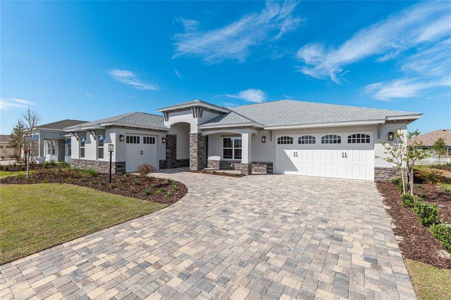 Front exterior of a new home in , Ocala, FL, highlighting curb appeal (Image 27). Front exterior of a new home in , Ocala, FL, highlighting curb appeal (Image 27).
