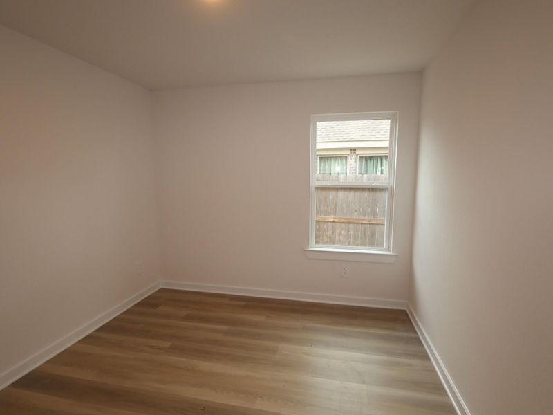 Spacious, unfurnished interior of a new home in Pinewood at Grand Texas, New Caney (Image 24).