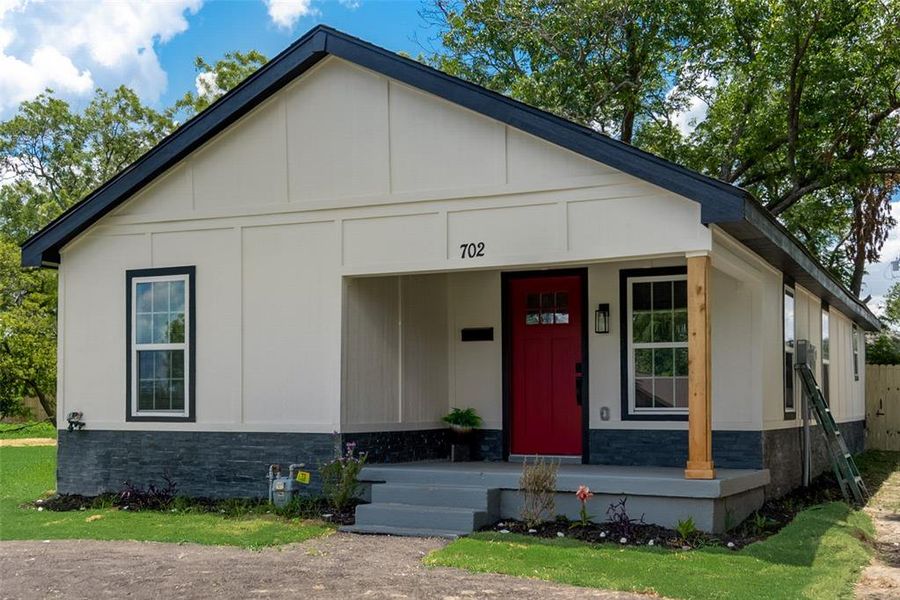 View of front of home featuring covered porch