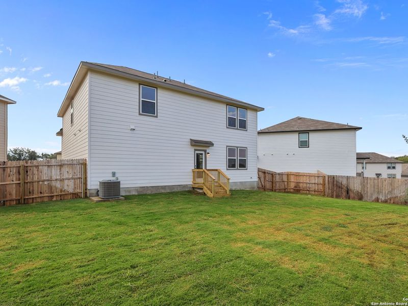 Exterior details and patio area of a home in Royal Crest, San Antonio (Image 4).