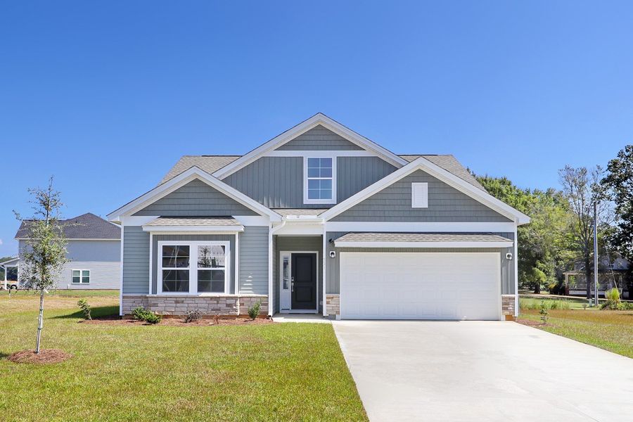 Front exterior of a new home in Garden Grove, Conway, SC, highlighting curb appeal (Image 1). Front exterior of a new home in Garden Grove, Conway, SC, highlighting curb appeal (Image 1).
