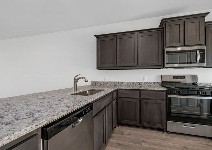 The kitchen has sprawling granite countertops. The kitchen has sprawling granite countertops.