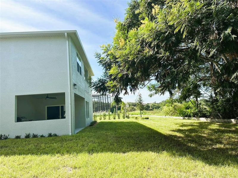 Front exterior of a new home in , Haines City, FL, highlighting curb appeal (Image 24). Front exterior of a new home in , Haines City, FL, highlighting curb appeal (Image 24).