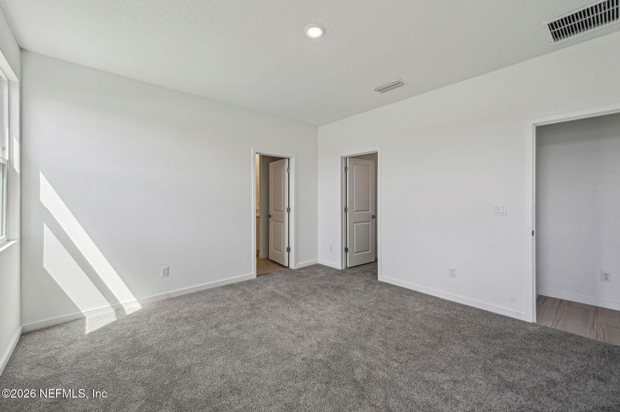 Spacious, unfurnished interior of a new home in Lakes at Bella Lago - Signature Series, Green Cove Springs (Image 24).