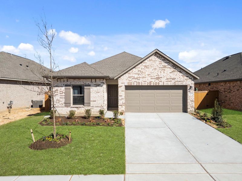 Front exterior of a new home in Cypress Green, Hockley, TX, highlighting curb appeal (Image 21).
