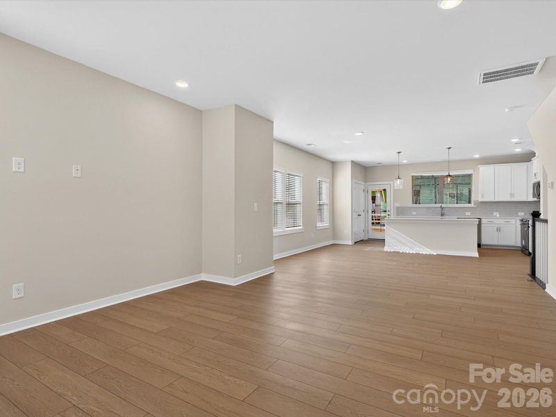 Spacious, unfurnished interior of a new home in Central Living at Craig, Charlotte (Image 21).