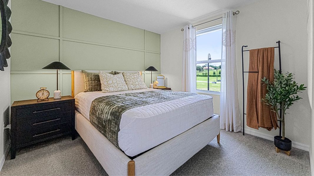 Representative furnished interior of a home built from the Sandhill by D.R. Horton in Waterleigh, Winter Garden (Image 9).