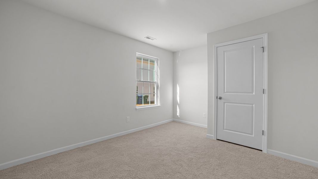 Spacious, unfurnished interior of a new home in Chandler Pointe, Rural Hall (Image 14).