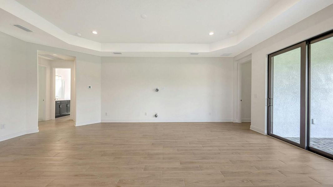 Spacious, unfurnished interior of a new home in Palm Grove Real Estate and Homes for Sale in Lakewood Ranch, FL - Neal Communities, Lakewood Ranch (Image 47).