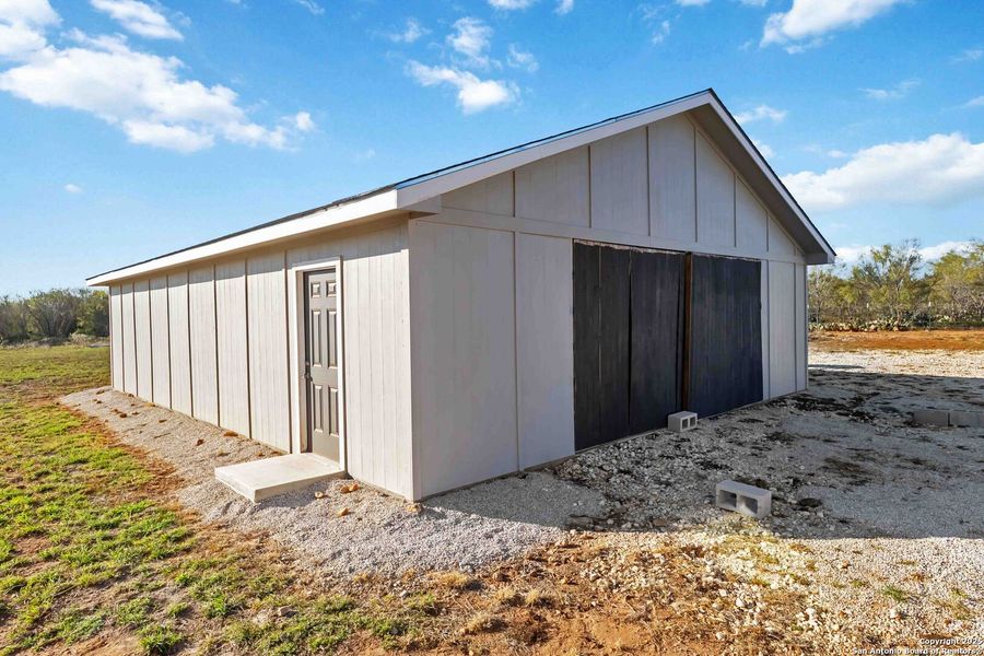 Exterior details and patio area of a home in , Devine (Image 23). Exterior details and patio area of a home in , Devine (Image 23).