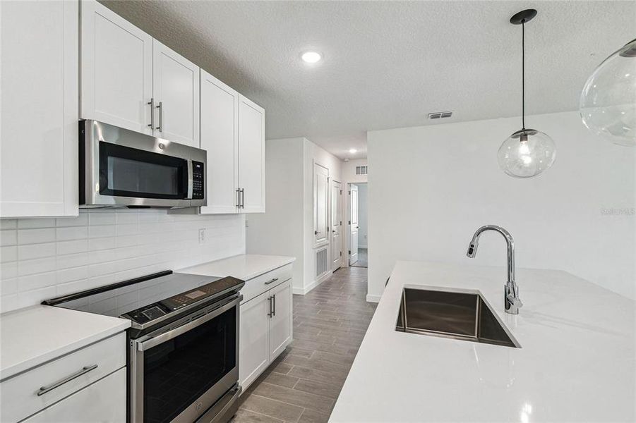 Furnished interior view inside a new home in Aspire at The Pines, Dunnellon (Image 5).