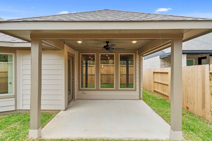 Exterior details and patio area of a home in Grand Central Park, Conroe (Image 4).